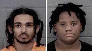 CMPD: Two charged in armed robbery, shooting at an officer