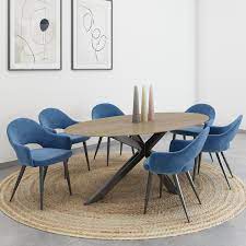 The most durable materials for an oval dining table for 6 are still good old hardwoods like mahogany, maple, oak, or walnut. Carson Oak Oval Dining Table With 6 Blue Chenille Dining Chairs Furniture123
