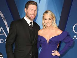 Carrie underwood has been traveling while promoting her new book. Carrie Underwood Mike Fisher Open Up About Faith Marriage Loss More In 4 Part Short Film God Country Watch Trailer The Country Daily