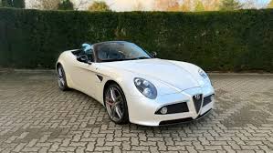 Image result for Bianco Dorato 2010 Alfa-Romeo