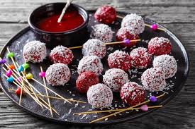 What's low in calories that can be mixed with bourbon? Premium Photo Low Calorie Dessert Berry Bliss Balls With Desiccated Coconut Mixed With Peanut Butter And Fresh Mix Of Raspberries Blackberries Blueberries On A Black Plate On A Wooden Table Top View