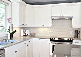 This will give the bathroom and kitchen a monochromatic feel, especially if the walls or paneling are painted a deep amber or maroon. White Subway Tile Backsplash With Maple Cabinets Novocom Top