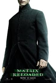 A character jumps through a window breaking it, falls toward the ground below, and shoots up at someone following; Matrix Reloaded The Matrix Movie Matrix