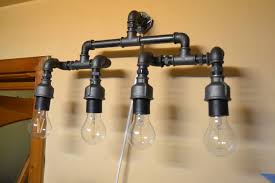 Check out our industrial bathroom vanity light selection for the very best in unique or custom, handmade pieces from our lighting shops. Pin On Steampunk Furnishings