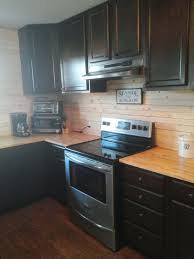 I see a lot of kitchens with wood shiplap but don't know how it would wear. 13 Incredible Kitchen Backsplash Ideas That Aren T Tile Hometalk