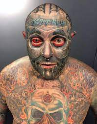 Tattoo addict inks his PENIS and colours his eyeball red after blowing  £60,000 to cover 90 per cent of his body – The Sun | The Sun