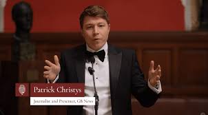 Patrick Christys launches passionate defence of England flag in fiery  Oxford Union showdown: 'Our great country!'