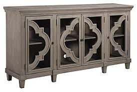 Consider a console cabinet an essential piece in an open living room floor plan. Accent Storage Cabinets Ashley Furniture Homestore