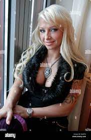 dpa file) A file picture dated 07 January 2010 of German porn actress Cora  smiling for the 10th season of 'Big Brother' in Cologne, Germany. Cora died  on 20 January 2011 after