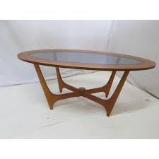 The glass is.75 thick and very heavy. Vintage Oval Coffee Table In Teak Design Market