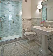 Because stone can be polished to a glimmer, using carrara bathroom tiles on the walls reflects light off making the entire room look illuminated and fresh. Floating Toilet Transitional Bathroom Anne Chessin Designs