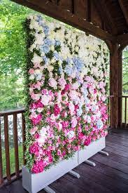 A photo wall gallery can instantly transform and any room and when you use your favorite family photos, it also is an inexpensive option for wall. 15 Flower Wall Wedding Ideas Our Favourites