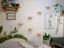 Instead of a cat tree, we decided that we were going to build cat shelves on our wall. Klattra Forest Pack Minimal Wall Mounted Cat Steps And Shelf Etsy Wall Mounted Shelves Cat Shelves Modular Walls