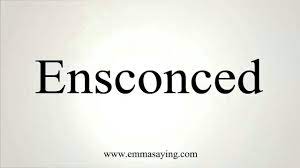 'in the wide corridor, the candles guttered in the sconces on the wall.'. Ensconced Syllabification En Sconce Pronunciation É™nËˆskans Verb Past Tense Ensconced Past Participle Ensconced Words Secret Places English Dictionaries