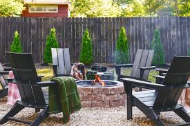 Starting a fire in a fire pit. Build A Backyard Fire Pit This Weekend Yellow Brick Home