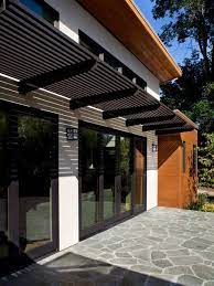 The project also consist of outdoor furniture by the patio district, pool deck with gold travertine material, and an ivy wall with led lights and custom construction with. Sign In New Avenue Homes Modern Outdoor Patio Door Canopy Modern House Exterior