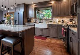 Cherry cabinets and white wall in the kitchen is a great choice. Kitchen Remodel With Cherry Wood Cabinets Viking Kitchen Cabinets