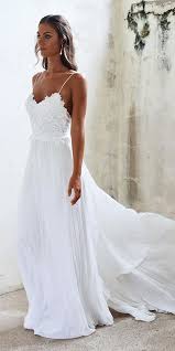 24 Romantic Bridal Gowns Perfect For Any Love Story Wedding Dresses Guide White Beach Wedding Dresses Coast Wedding Dress Beach Wedding Dress Boho