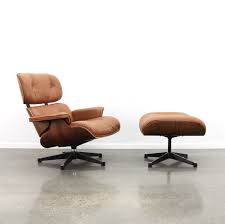 It's tempting to say that if it looks like a duck, quacks like a duck, and. Cognac Leather Rio Palissander Eames Lounge Chair Ottoman By Vitra 1980s 86746
