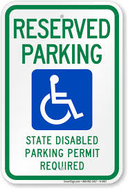 Accessible parking spaces must be identified by signs that include the international symbol of accessibility. Disabled Reserved Parking Permit Required Sign