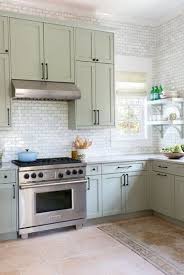2018 New Neutral Pinterest Trend Sage Green Apartment Therapy In 2020 Green Kitchen Cabinets New Kitchen Cabinets Kitchen Cabinet Colors