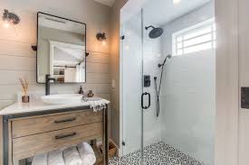 The bathroom tile ideas in the picture creates a clear separation between the floor and wall. The Best Shower Tile Ideas And Diy Tiling Tips Visualhunt
