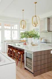 A kitchen island can really help to enhance the cooking experience by providing a central space to installing a wine rack or cooler into the unit can help to promote the social element; Island Wine Fridge Contemporary Kitchen Pne Prize Home