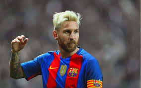 ￼the roman catholic church in barcelona appears prominently on the arm. Image Lionel Messi Unveils Bizarre Leg Tattoo