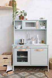 A dream come true for small chefs. 15 Incredible Ways To Remodel Ikea S Duktig Play Kitchen Cuisinette Ikea Cuisine En Bois Enfant Cuisinette