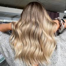 This color has a purple base to it, which neutralizes the unwanted yellow tones. Your Guide To Dark Roots On Blonde Hair Wella Professionals