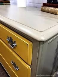 So, it's my favorite paint to use when i want to distress painted furniture. How To Update Your Old Furniture With Yellow Dresser Drawers