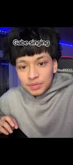 Gabe Patillosinging with Toby Mac