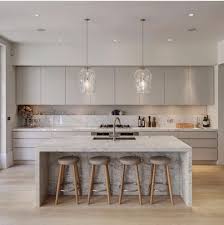 I Like The Solid Wall Flat Cabinets Clean Lines And Waterfall Marble Island Home Decor Kitchen Modern Marble Kitchen Kitchen Interior
