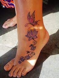 Popular Tattoo Design Butterfly And Stars Tattoo On Foot Butterfly Ankle Tattoos Butterfly Foot Tattoo Ankle Tattoos For Women