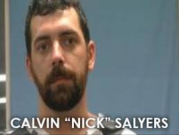 Alexander officer surrenders to authorities