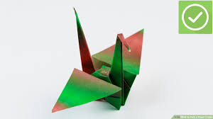 Carefully peel back the first layer of paper at the bottom and open it upwards. How To Fold A Paper Crane With Pictures Wikihow