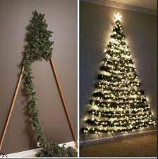 This Is A Great Idea For A Christmas Decoration And Space Saving Pics Wall Christmas Tree Flat Christmas Tree Christmas Decor Diy