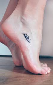 50 Simple And Small Minimalist Tattoos Design Ideas For Women Who Ll Want To Make Right Now Minimalist Tattoo Small Mountain Tattoo Foot Tattoos