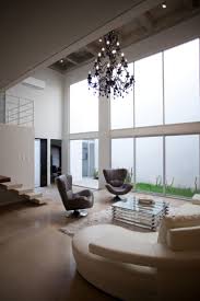 Do you have a high ceiling in your living room? 25 Tall Ceiling Living Room Design Ideas