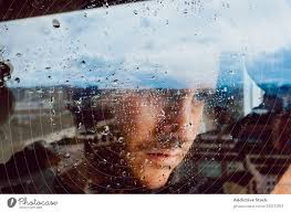 Melancholic Young Woman Looking Through Window A Royalty Free Stock Photo From Photocase The image has been used in situations where one is.