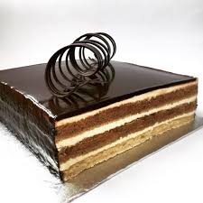Tiramisu Cake With Coffee Sponge Vanilla Mascarpone Cream And Hazelnut Almond Dacquoise Base Decorated With Chocolat Cake Tiramisu Cake Chocolate Decorations