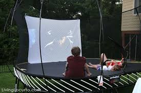 Songmics trampoline stands out of the market with its outstanding product quality. Outdoor Movie Night With Springfree Trampoline Backyard Trampoline Outdoor Movie Nights Backyard Camping