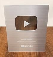The gold play button is a limited item that moderately boosts the chance of the youtuber customer going to your restaurant. Youtube Creator Awards Wikipedia