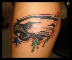 As a native pennsylvanian i immediately recognize this tattoo as the old logo for the philadelphia eagles football team. Ink Philadelphia Eagles Sports Tattoo Tattoo Ideas Center
