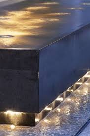 Backyard water feature idea with spiraling staircase. 16 Stairs Water Ideas