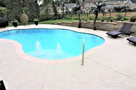A Spray Texture Is Creating A Craze In The Pool Deck Industry Thanks To Its Non Skid Cool Decking Surface D Decks Around Pools Concrete Pool Pool Renovation