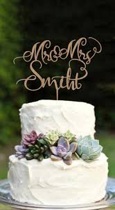 Final wedding cake, decorated with roses and monogram. 10 Easy Ways To Create A Simple And Elegant Wedding Cake Of Your Own Elegantweddinginvites Com Blog
