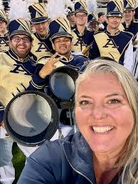 Made some new friends at the game tonight! Thank you for working together  to deliver an excellent game day experience under the lights!  #akronathletics #akronbands #zips