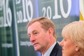 Opposition cries foul as Enda Kenny delivers the first of 3,300 tricolors  ahead of 1916 commemorations