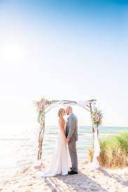 Wedding Photography On The Beach Of Lake Michigan In Grand Haven Michigan Lake Michigan Wedding Traverse City Wedding Beach Wedding Photography